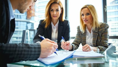 Expert tax consultants assisting clients with tax planning and preparation